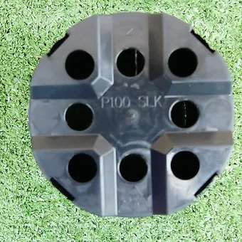 acbe41_699fa856b248483da6743055a52a5480~mv2 Bottom view of a black round plastic nursery pot with multiple drainage holes and raised structural ribs.